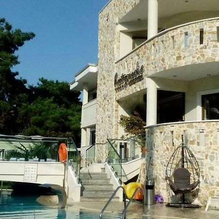 Hatzoudis Luxury Suites Chrisi Ammoudia Esterno foto