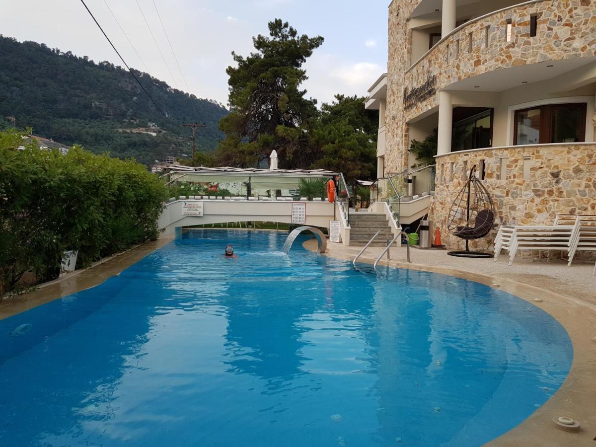 Hatzoudis Luxury Suites Chrisi Ammoudia Esterno foto