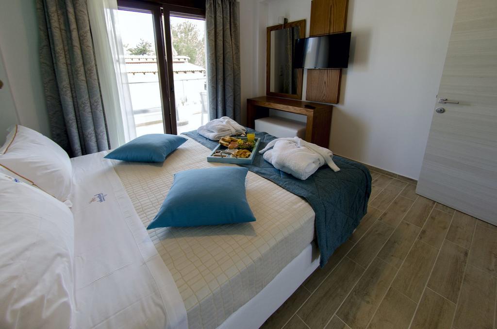 Hatzoudis Luxury Suites Chrisi Ammoudia Esterno foto